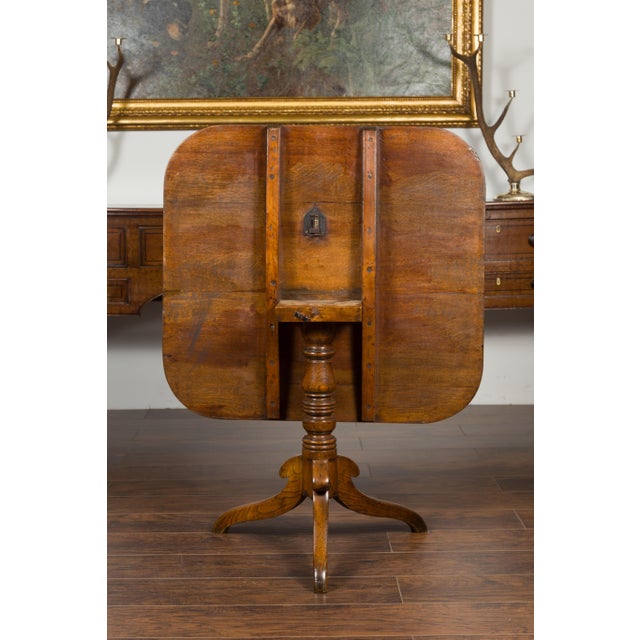 English 1870s Oak Tilt-Top Table with Turned Pedestal and Tripod Scrolling Feet For Sale - Image 9 of 9