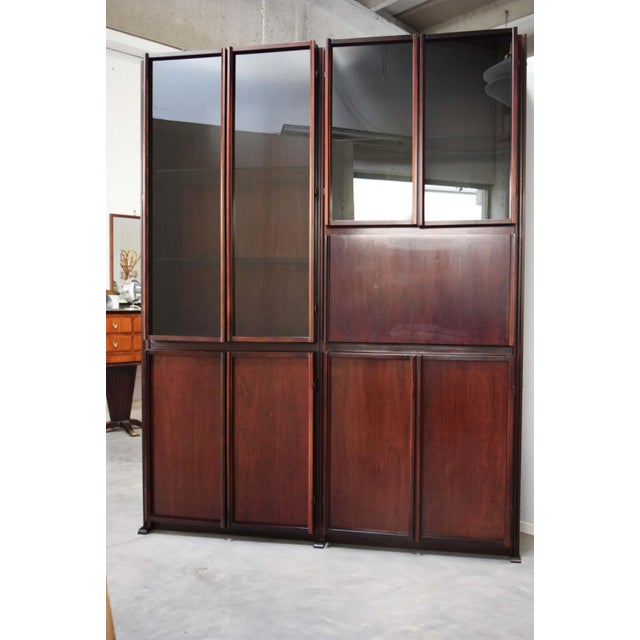 "GS" model cabinet with modular elements by Gianni Songia for Sormani, Italy, 1960s. The cabinet is in rosewood-like wood,...