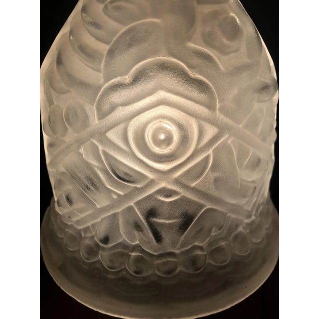 Beautiful French Art Deco lamp in thick molded glass shade with an atypical pattern and superb wrought iron base. European...