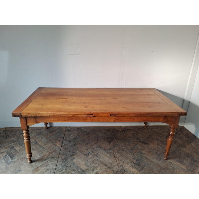 Hutton-Clarke antiques is pleased to offer a good mid 19th century French farmhouse table in solid cherrywood of generous...