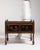 A decorative jardinière featuring detailed painted or carved floral and bird motifs characteristic of mid-19th century...