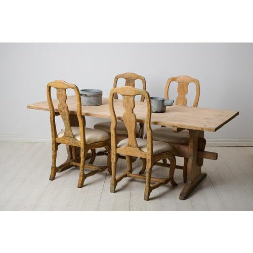 Large Swedish trestle table from the 1840s. This table is an authentic antique and would work well as either a dining or...