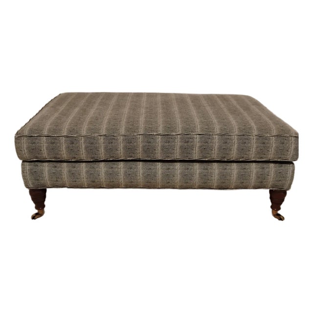 Baxter Coffee Table Ottoman With Brass Wheels For Sale