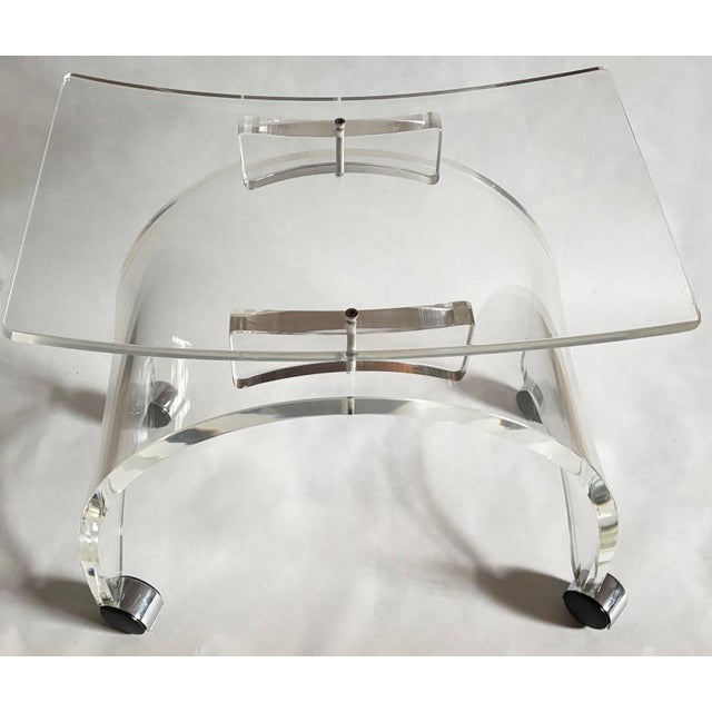Eye catching MCM Lucite stool Sits comfortably as the seat curves slightly upwards on the sides. Would be great as a...