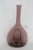 This beautiful Swedish Pinched Bulb Vase is made of glass. This vase presents a lovely purple color that perfectly...