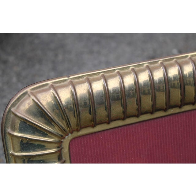 Italian Brass Photo Frame attributed to Tommaso Barbi, 1970s, in Very Good conditions. Designed 1970 to 1979 This piece is...