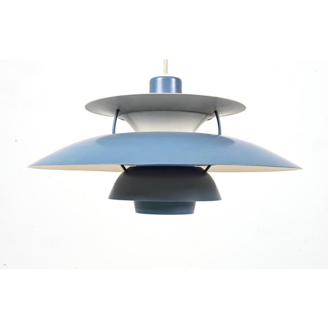 This iconic Danish 1960's hard to find blue-toned ceiling pendant light was designed by Poul Henningsen for Louis Poulsen....