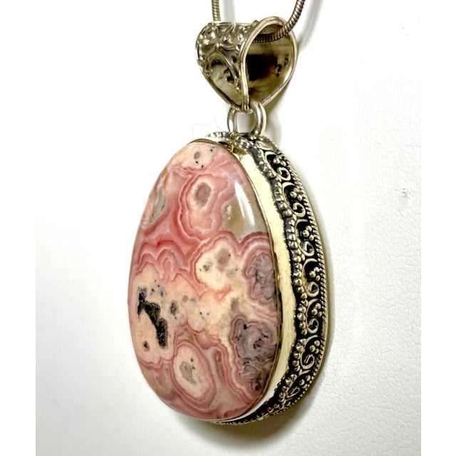 This is part of Chairish’s Costume Jewelry assortment. Pseudomorph agate comes from rare stone formations where one...