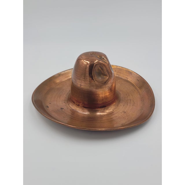 A charming piece of mid-century Mexican folk art, this hand-hammered copper sombrero features a deep, warm patina and...