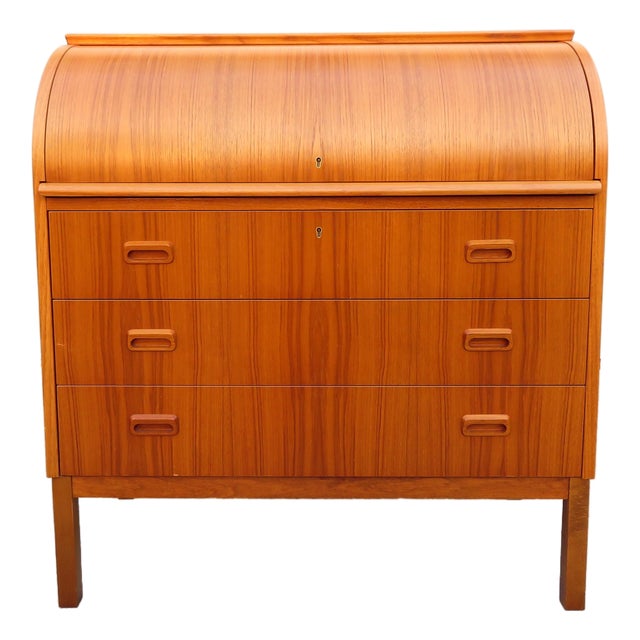 A true vintage, mid century modern Scandinavian classic! Teak rolltop secretary desk with the original key. All three...