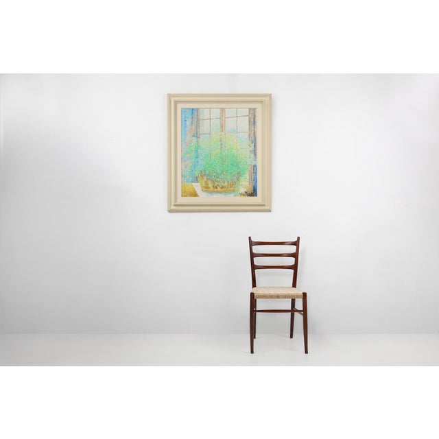 Oil painting by the Belgian artist Theo van Rintel, of a potted plant gracefully positioned in front of a window,...