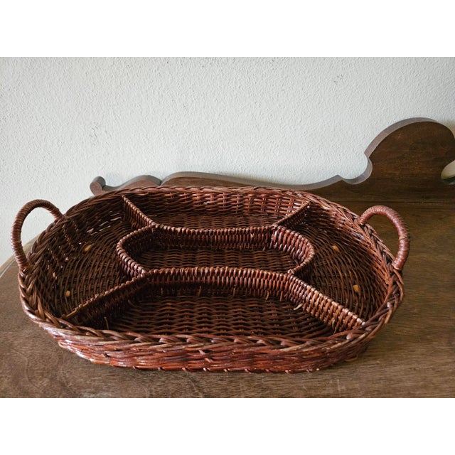 Vintage oval divided wicker basket with handles. This basket would be perfect to store utensils and other essentials for...