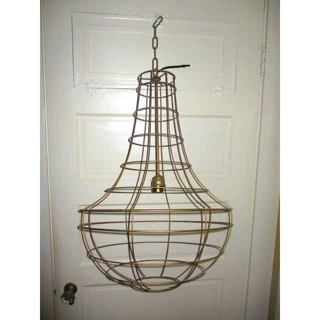 This is a Fabulous! Vintage French Style Wire Basket Gold Colored Teardrop Chandelier that can be hung for a Mid Century...