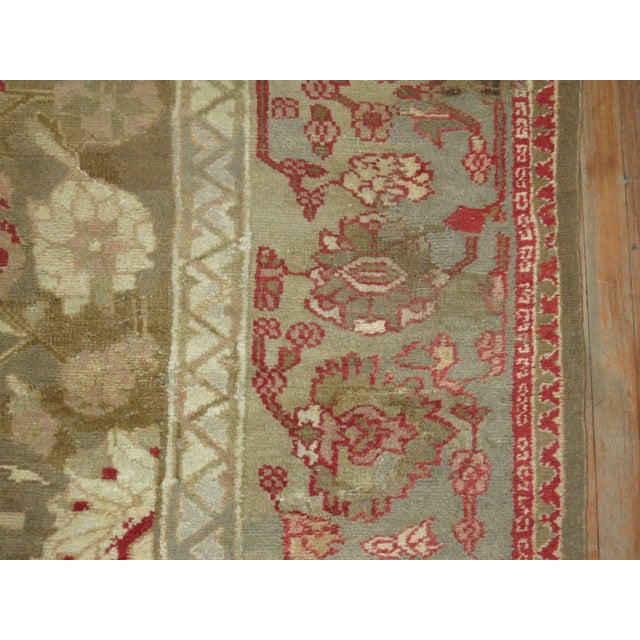 An oversize late 19th-early 20th century antique Indian Agra carpet. Large-scale Pigeons can be spotted on green colored...