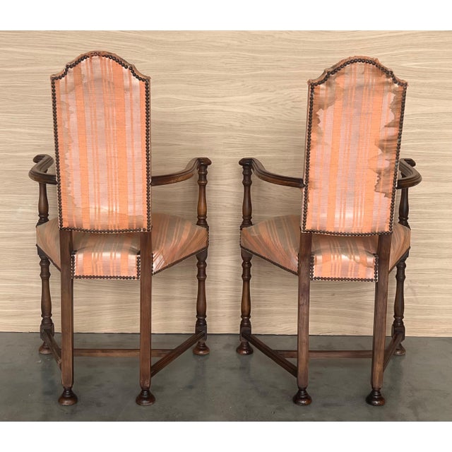Pair of Spanish Armchairs with High Back signed by Valenti The fabric is dirty and needs a reupholstered.