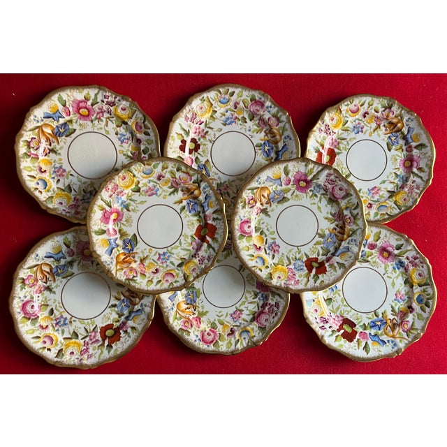Set of 8 English fine bone china floral 8" porcelain plates by Hammersley. Each decorated with a bright band of flowers...