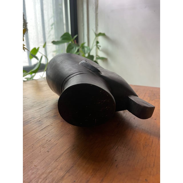Gorgeous MCM sculptural Egyptian heads in deep ebony brown. Vintage decorative pieces can be used as bookends. Some age...