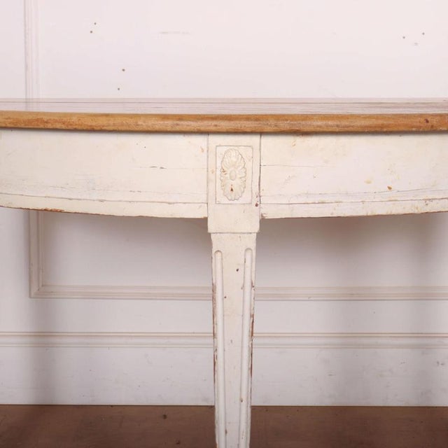 Early 19th C Swedish painted demi-lune console table. 1830 This piece is designed in the style of the selected designer...