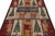 Hand-knotted in wool, this 6x7 Moroccan flatweave rug made by our partners in India, features pictorial depictions of...