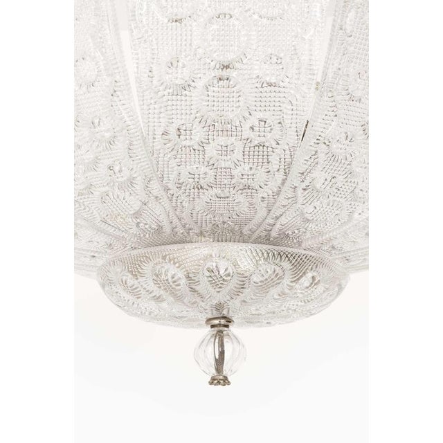 This very rare ceiling lamp, designed by Carl Fagerlund and produced by Orrefors in Sweden, exemplifies the refined...