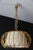 Magnificent Mid-Century pendant light inspired by the Riviera, entirely crafted from hand-bent rattan and woven wicker,...