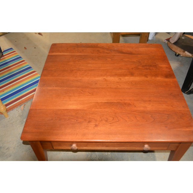 This is a solid & well made wooden coffee table. I believe the company used birch or maple wood. Has a cherry look finish....