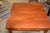 This is a solid & well made wooden coffee table. I believe the company used birch or maple wood. Has a cherry look finish....