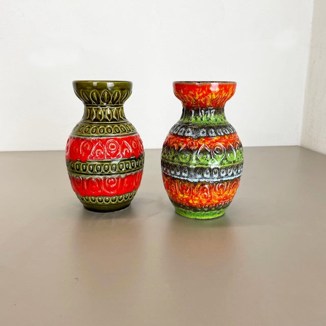 Set of 2 original vintage 1970s pottery ceramic vase made in Germany. High quality German production with a nice abstract...