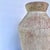 A beautiful textured ancient-style vase with soft pink and cream undertones that adds warmth to any space. Pair with other...