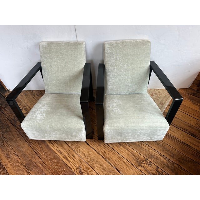 Pair of luxe low profile sophisticated custom club chairs having ebonized wood frames and light gray/light mint velvet...