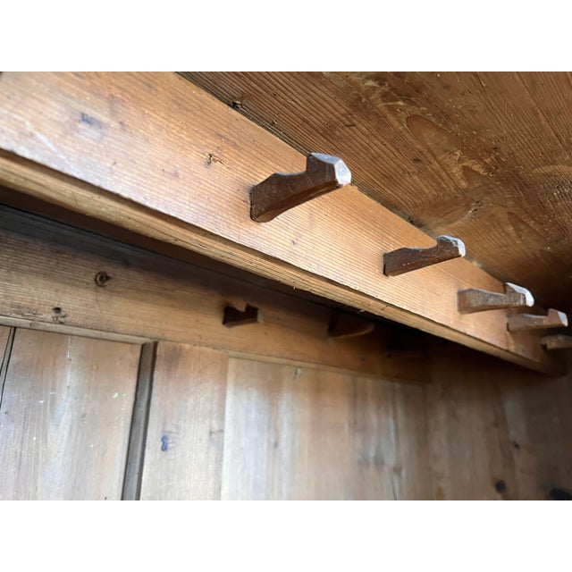 Spanish wardrobe, with one door, entirely painted in black with flowers.