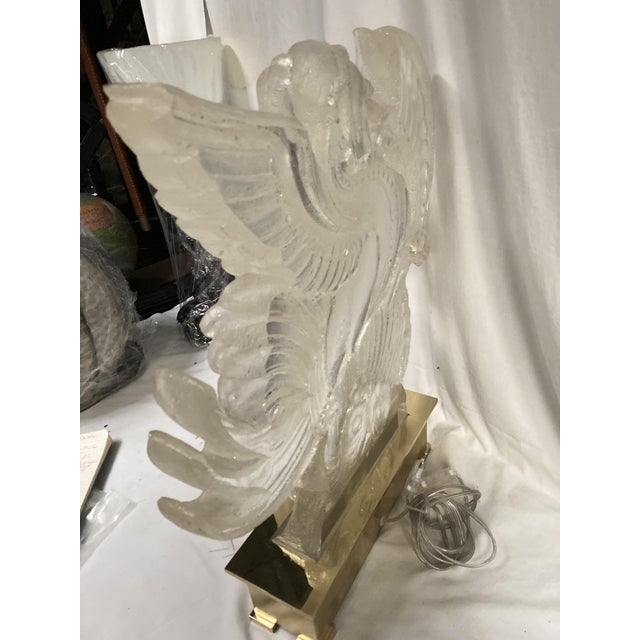 Very rare "phoenix" lamp in resin by Roméo Paris This piece is attributed to the mentioned designer/maker. It has no...