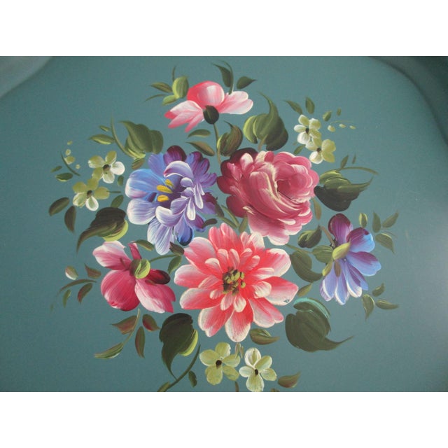 This elegant vintage Nashco metal tray features a hand-painted floral design in vibrant hues atop a green scalloped metal...