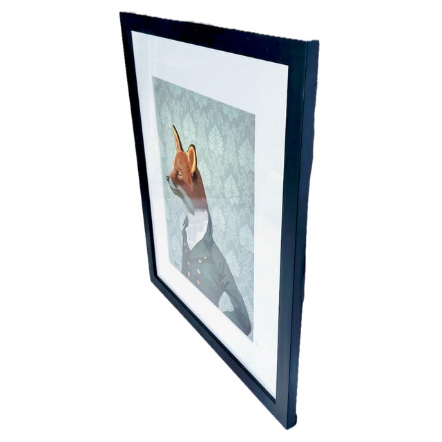 A charmingly ironic and witty framed print of a fox dressed in traditional English gentleman's attire. With damask pattern...