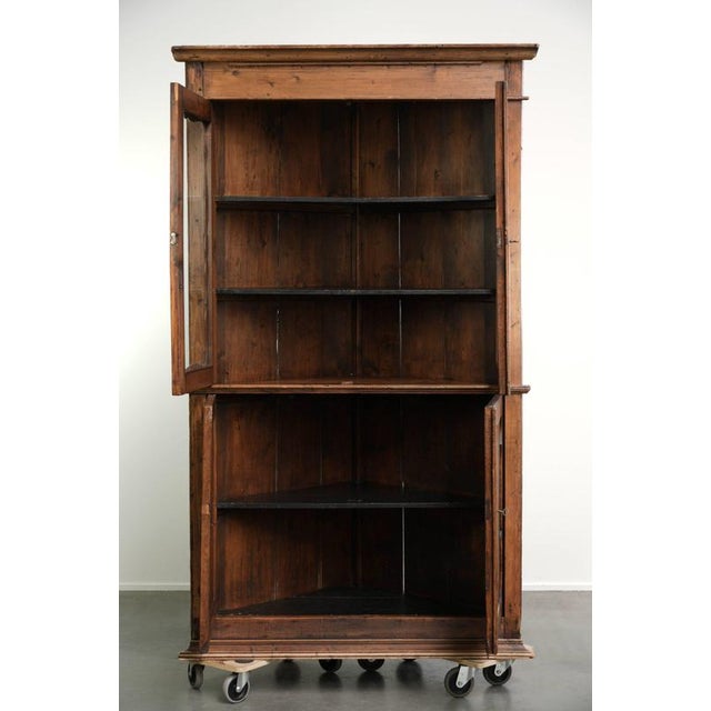This practical old Dutch pine corner cabinet features exquisite details and a lovely patina. The cabinet dates from the...