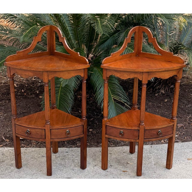 A pair of useful corner stands with high cut out backs and 2 small drawers. I can think of so many places to use these...