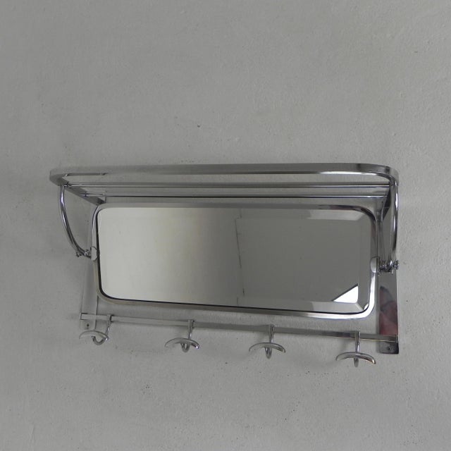 Art Deco Wall Coat Rack with Adjustable Faceted Mirror in Chrome Frame, 1930s, in Very Good conditions. Designed 1920 to 1949