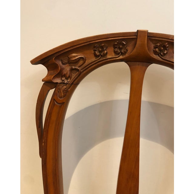 Chocolate Early 20th Century Set of 4 cherry wood chairs decorated with flowers and plants. For Sale - Image 8 of 12