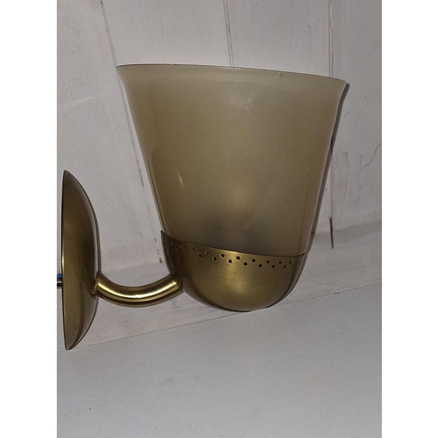 Vintage German Wall Lamp with Brass Bracket and Matte Tinted Glass Shade, 1970s , in Very Good conditions. Designed 1970...