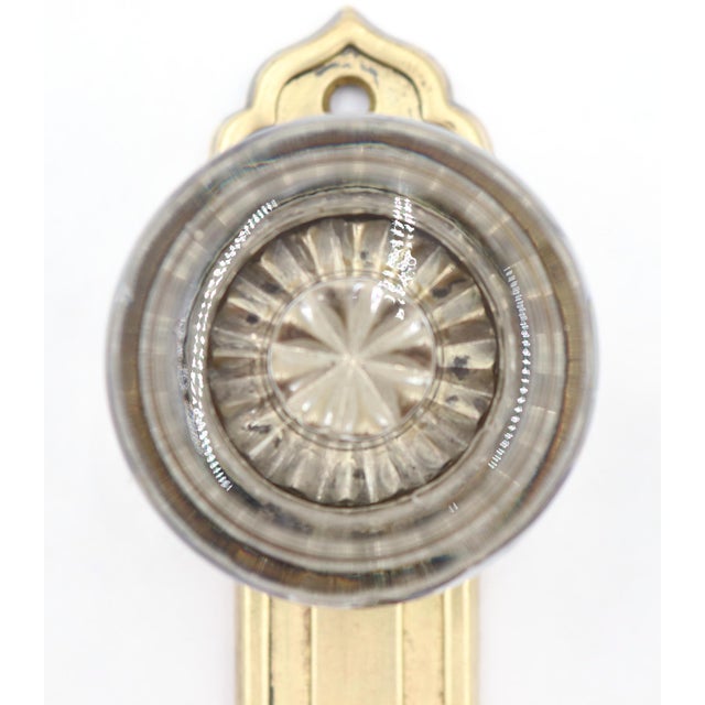 Vintage Art Deco style dummy door set with a glass knob and polished brass plate. The original mounting screws are not...
