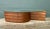 This vintage hand-made cyclone coffee table pairs a sweeping wooden base with an elliptical glass top. Carefully curved...
