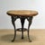 This characterful garden table combines a richly decorated cast iron base with a pine top, resulting in a particularly...