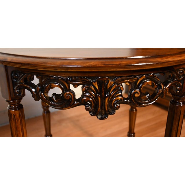 We are pleased to offer this beautiful Antique pair of French side tables , from the 1930s . This pair is made of carved...