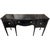 This elegant curved-front desk blends traditional craftsmanship with bold, dramatic styling. Finished in a rich black...