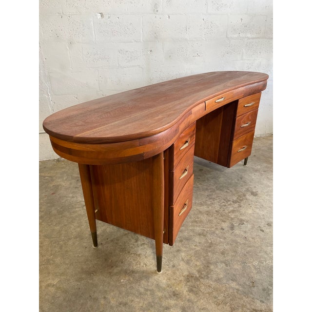 Rare Mid Century Modern Kidney Shaped Desk. Finished back. 74.5w 21d 30h