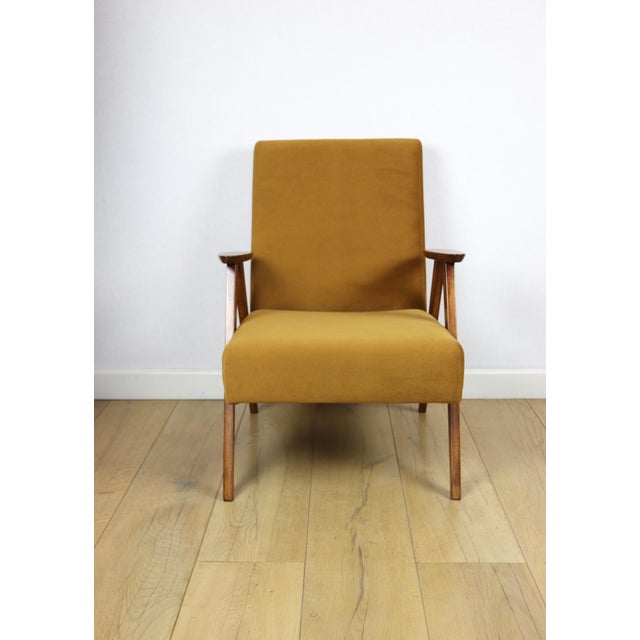 Classic vintage golden velvet armchair Jade, similar to the Chierowski model. 2 pieces available. Exceptional classic...