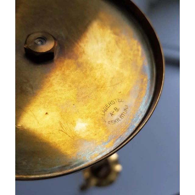 This pair of superbly designed Swedish brass candlesticks is in pristine condition. Made in the so-called Swedish Grace...