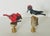 Lovely pair of handsculptured handpainted bird figurines , signed by artist with initials and mounted on brass bases as...