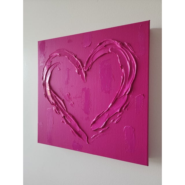 Pink heart painting measuring 12"X12". *Please note: colors may vary per screen.