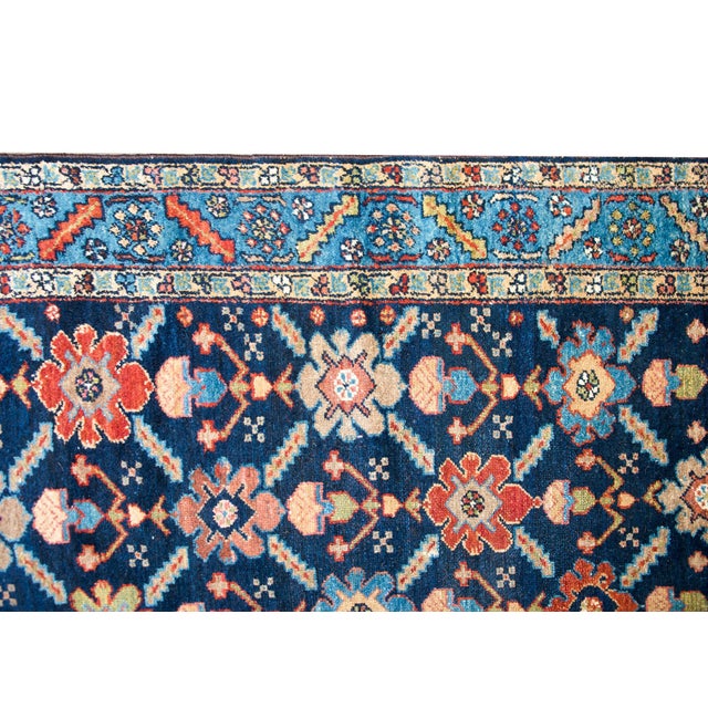 A wonderful early 20th century Persian Bakhtiari rug with a beautiful all-over trellis floral pattern with multi-colored...
